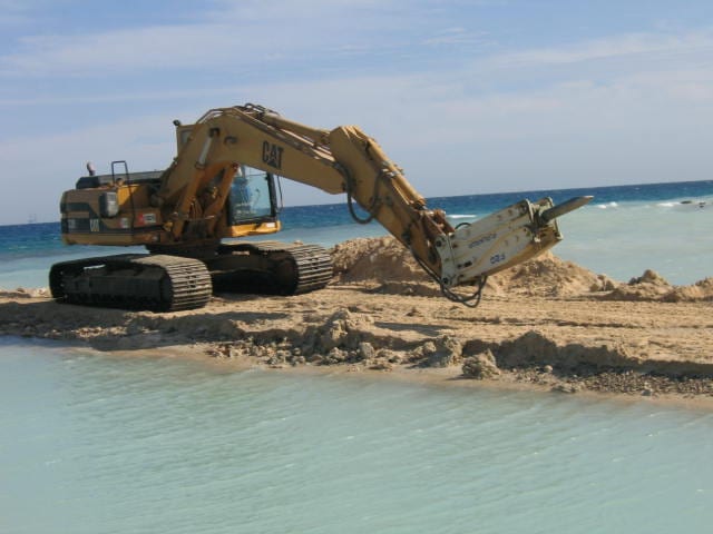 Trench excavation along the temporary causeway.